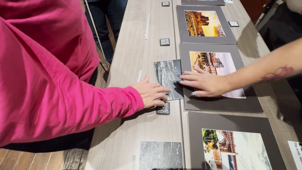 A closeup image of a person feeling a tactile print.